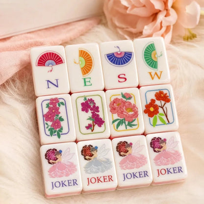 Pink floral Mahjong set photographed in use at a game night